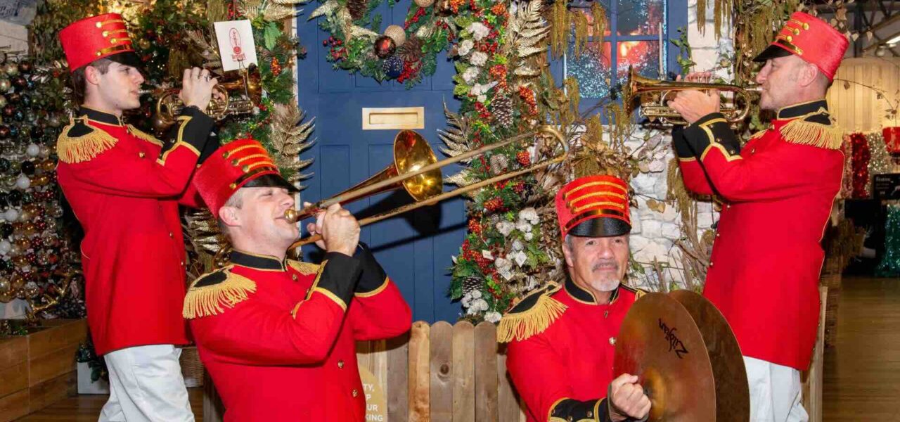 Traditional Christmas themed nutcracker band performing at a Christmas event.