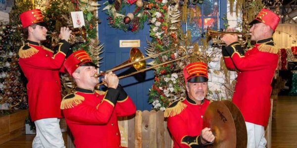 Traditional Christmas themed nutcracker band performing at a Christmas event.