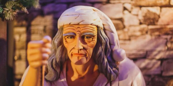 Face of life size scrooge prop figure used for a Victorian Dickensian Grotto theme.