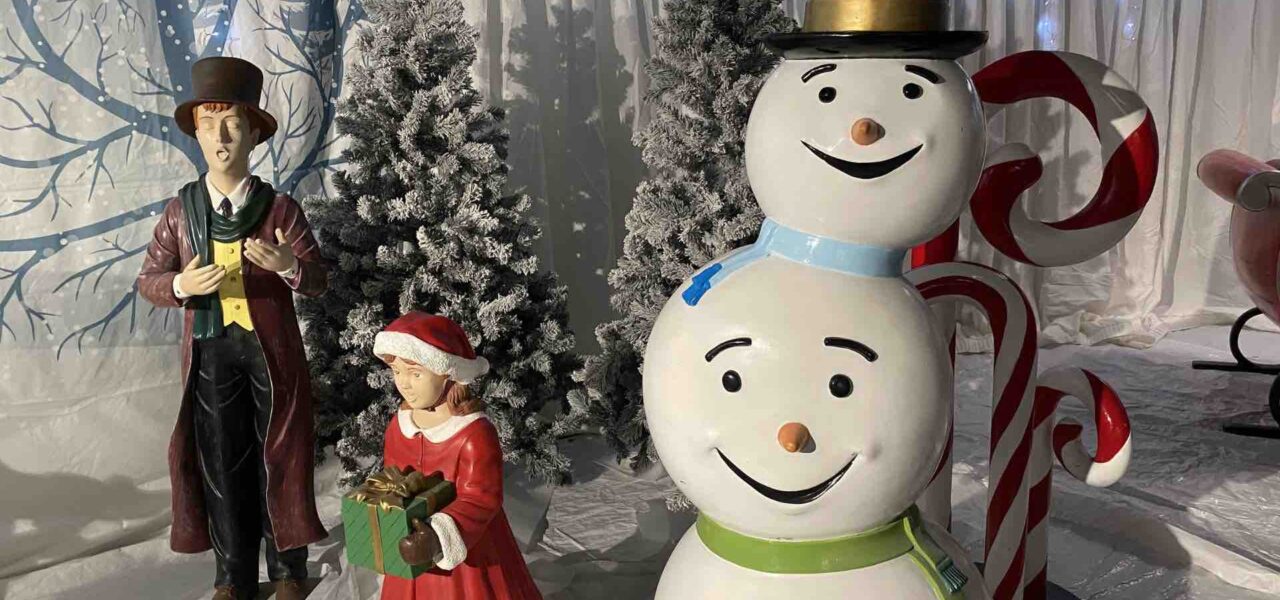 Christmas grotto props for classic Christmas themed events including snowman, carol singers and trees.