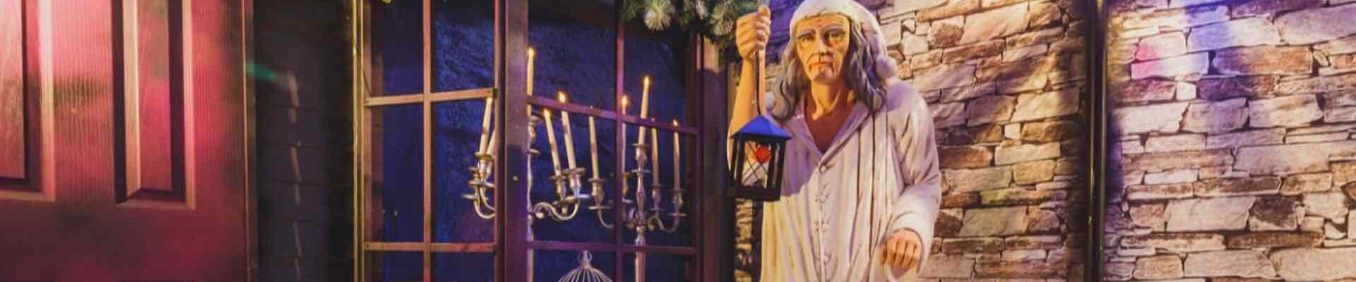 Scrooge life-size prop and Victorian Christmas theme grotto props.