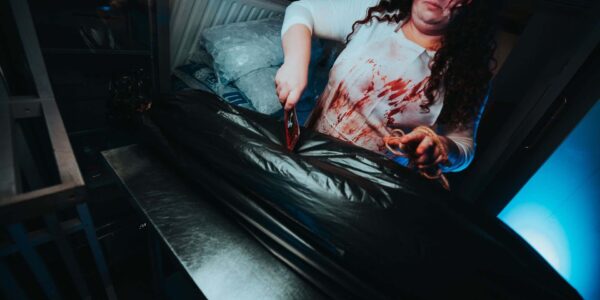 The butcher cutting up a victim in slaughterhouse theme created for Halloween.