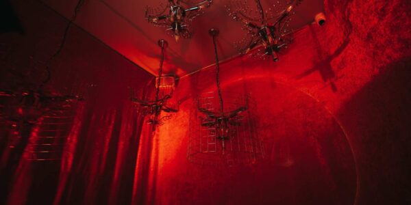 Dramatic blood red lighting used to decorate this slaughterhouse scene.
