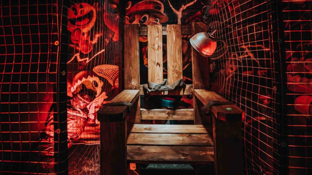 Electric chair prop in wood used for a SAW themed event in London.