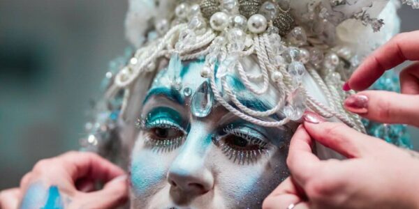 Ice-Queen-Stilt-Walker-Getting-Makeup-Done