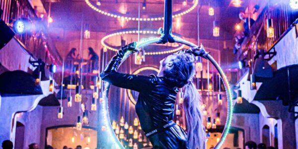 LED-Hoop-Aerial-Performer-Twisted-Around-Hoop