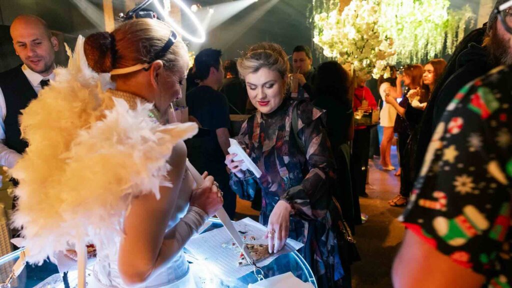 LED Roaming Table serving delicious food to guest at corporate event