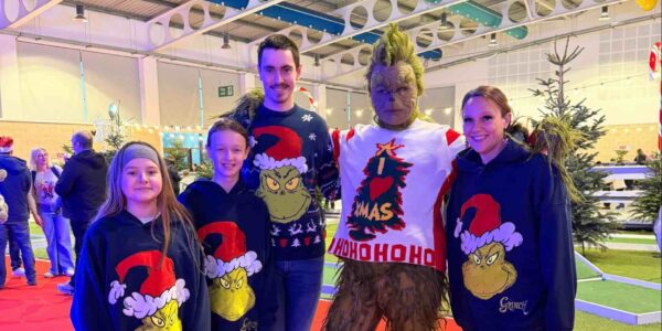 The-Grinch-Performer-Meeting-Families-At-Public-Events