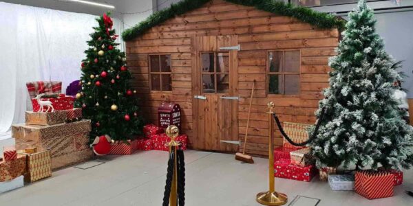 Bespoke Wooden grotto hire complete with festive interior and exterior props and scenery.