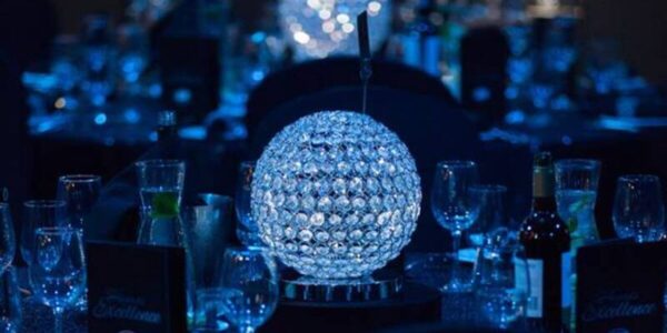Crystal globe centrepiece ideal for Winter Wonderland gala dinners.