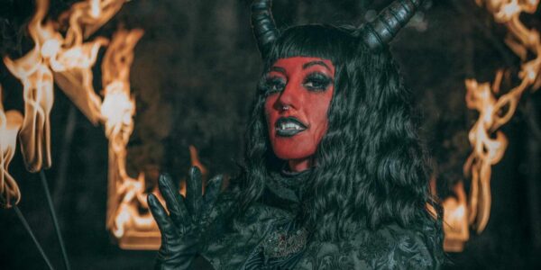 Devil-Fire-Performer-Posing-In-Front-Of-Flames