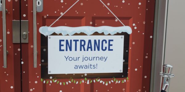 Entrance sign to a festive Christmas experience!
