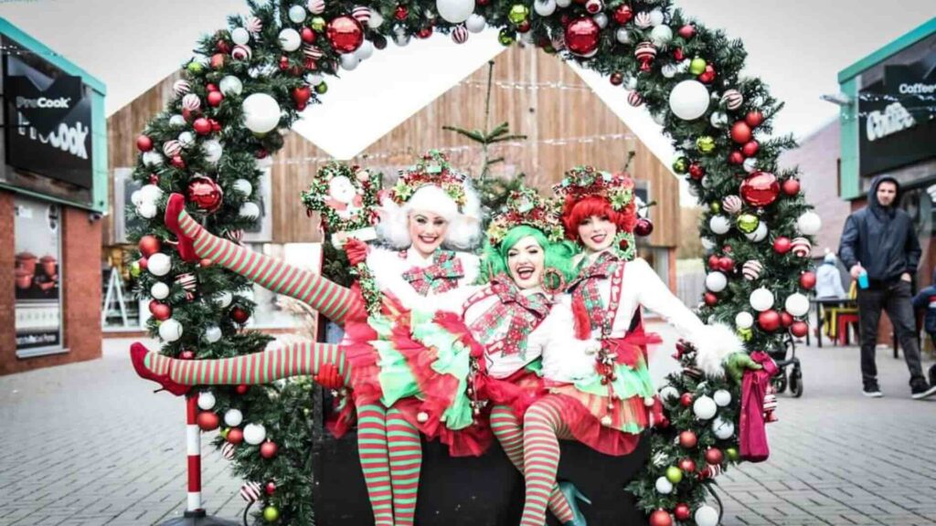 Three Festive Elves sat outside this festive season