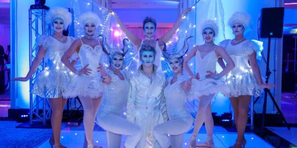 Group-Of-Performers-In-Winter-Wonderland-Theming
