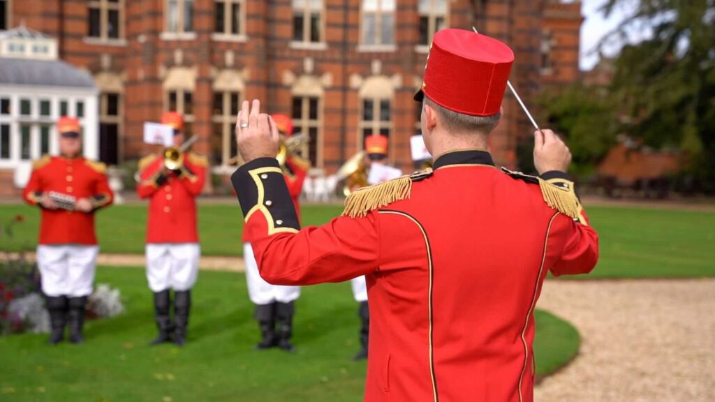 Nutcracker Trumpet Band conductor outside leading the band