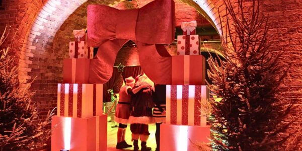 Bespoke present theming used for archway for Grotto.