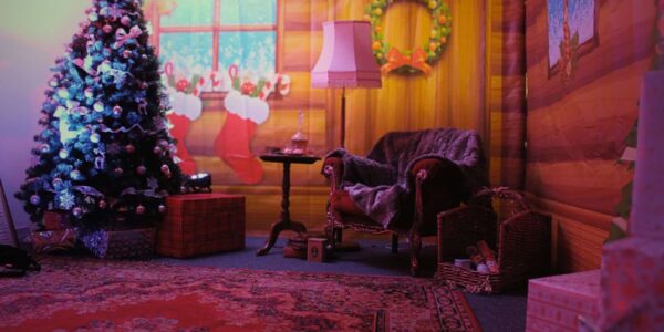 An simple yet immersive set up for children at Christmas Events,  our facade grottos include chair, rug and fireplace for a festive feel!