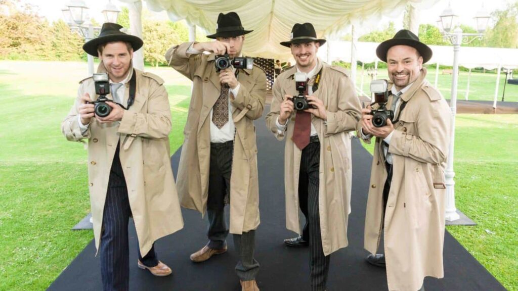 Fake Paparazzi waiting with cameras at event