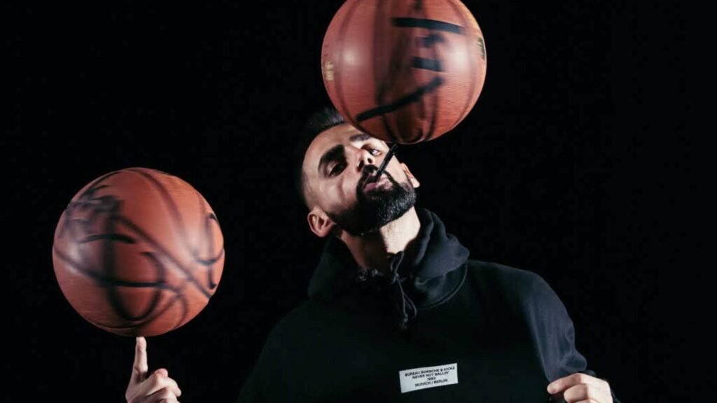 Sports Freestylist showing off his talents with basketballs