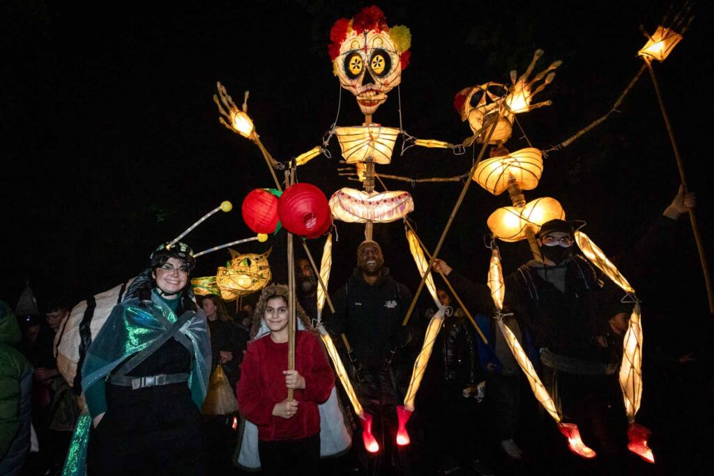 Two skeleton walkabout characters at an event.