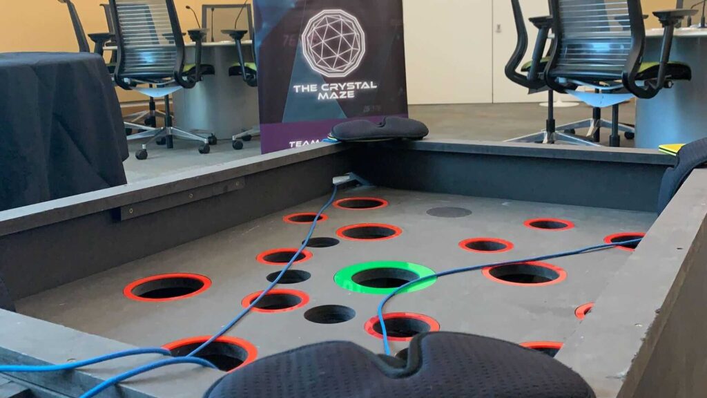 An activity challenge with holes in the ground and strewn ropes