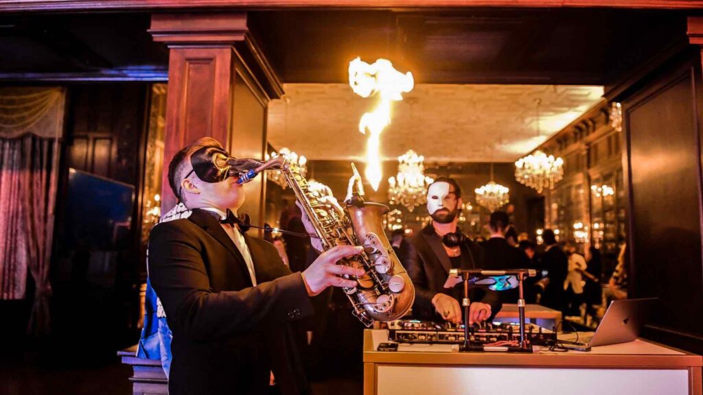 A flaming saxophonist performing at a Las Vegas Themed event