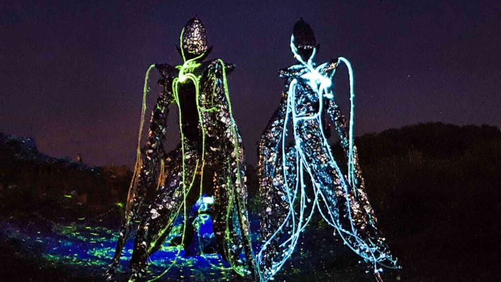 Alien inspired LED stilt walkers.