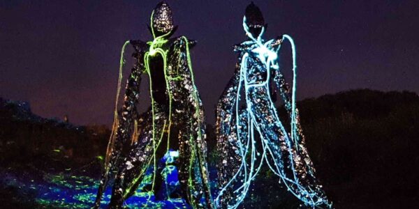 Alien inspired LED stilt walkers.