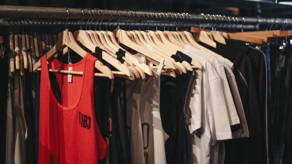 Clothes on rail prior to being customised.