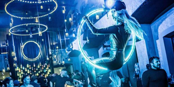 Space themed hula hooper performing for crowds.