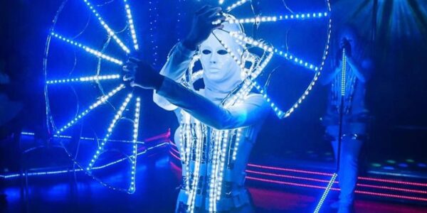 Unique white themed futuristic dancer performing at a brand activation.