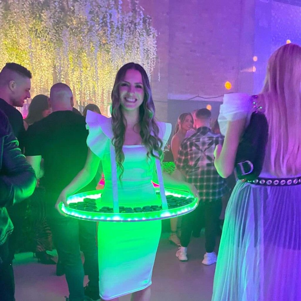 LED hostess table serving drinks at a space themed event.