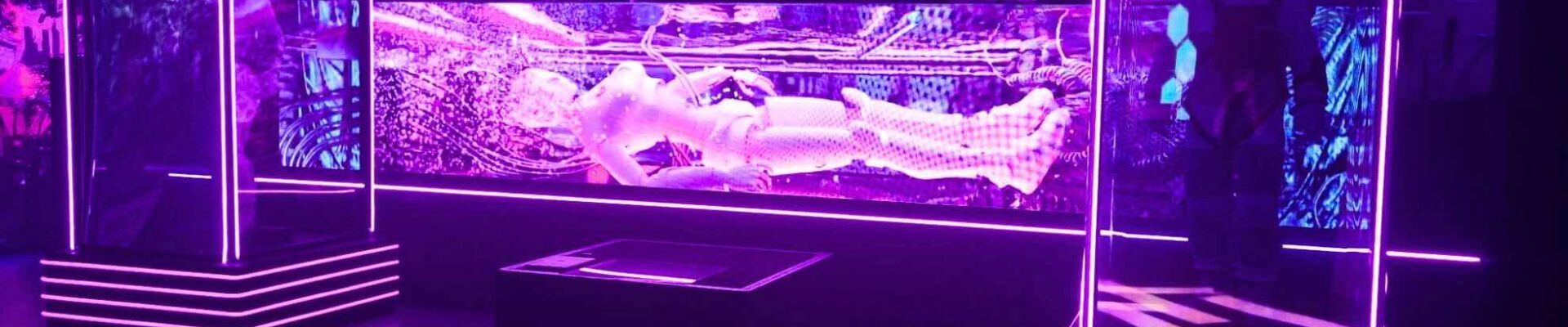 Glowing cyborg bespoke set design for space themed event.