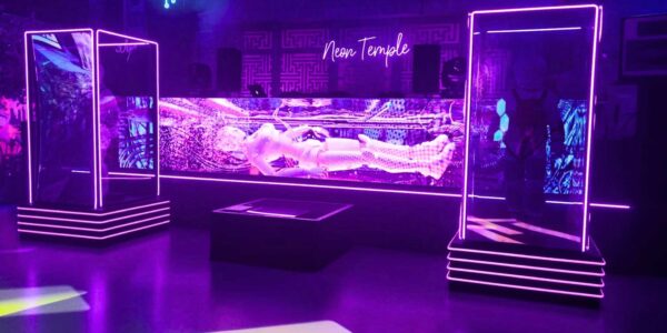 Glowing cyborg bespoke set design for space themed event.