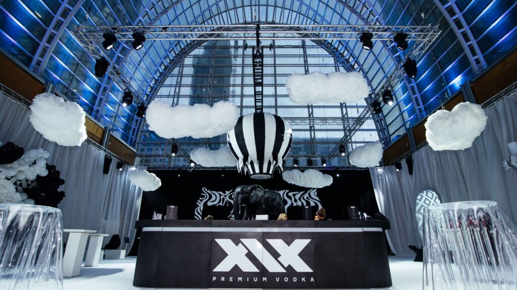 An image from the Sidemen Charity Match after-party bar, themed in a black and white look