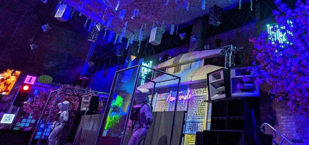 Space themed event installation with futuristic styling and decor.