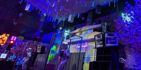 Space themed event installation with futuristic styling and decor.