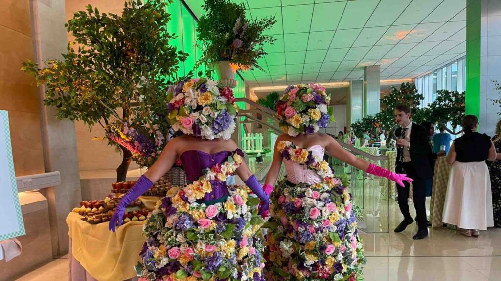 Floral head performers at Easter exhibition.