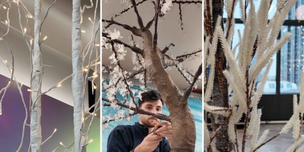 Our team installing enchanted forest tree props for an Office corporate event in London.