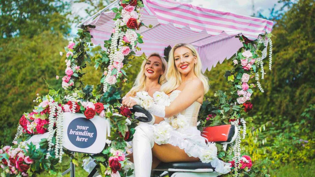 Floral performers in floral bike hired for Easter retail activation to enhance brand visibility.