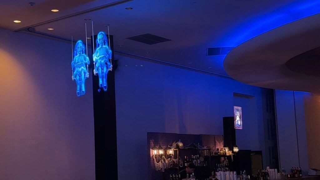 Incredible hologram projection of two people at an event