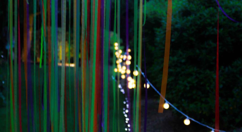 Festoon lighting at a mini festival.