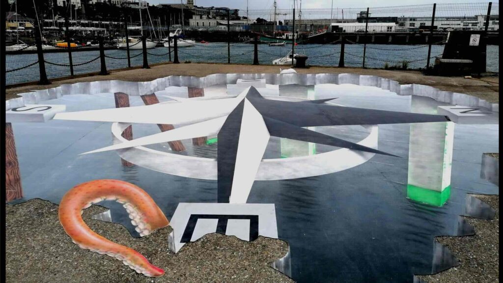 A 3D floor artist's work near a harbour