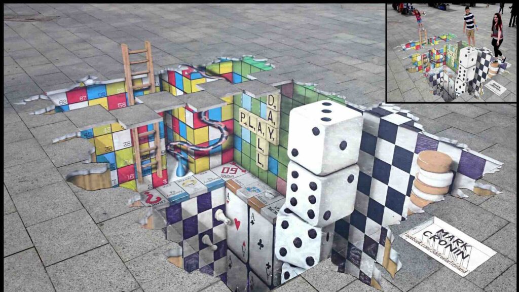 3D appearing floor artwork of dominoes and buildings in the floor
