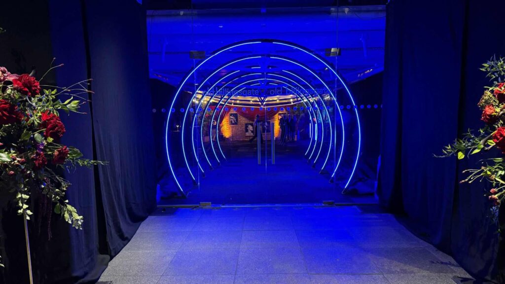 Outside of venue with tunnel entrance and reception room.