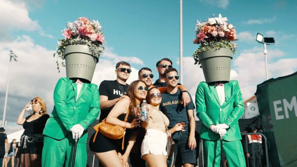Plant Pot Walkabout performers posing for a photo with guests