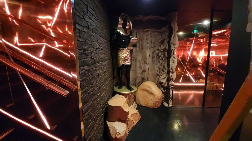 London Reign nightclub walkway transformation with tomb props.