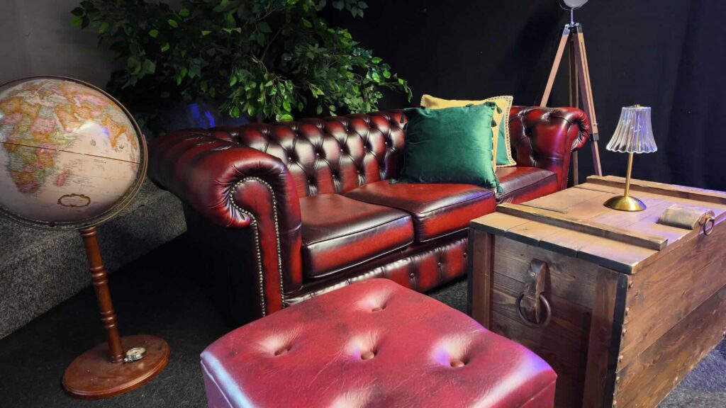 Relaxed seating and lounge area featured in a 1920's and Jazz themed event space.