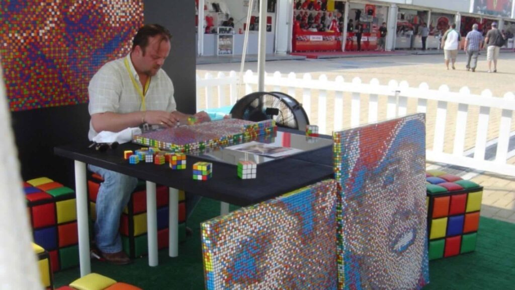 A rubik cube artist at an event