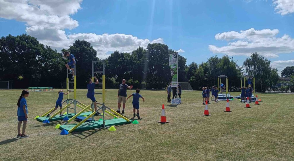 Sports corporate fun day themed assault course for sporting entertainment.